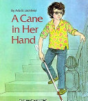 A cane in her hand /